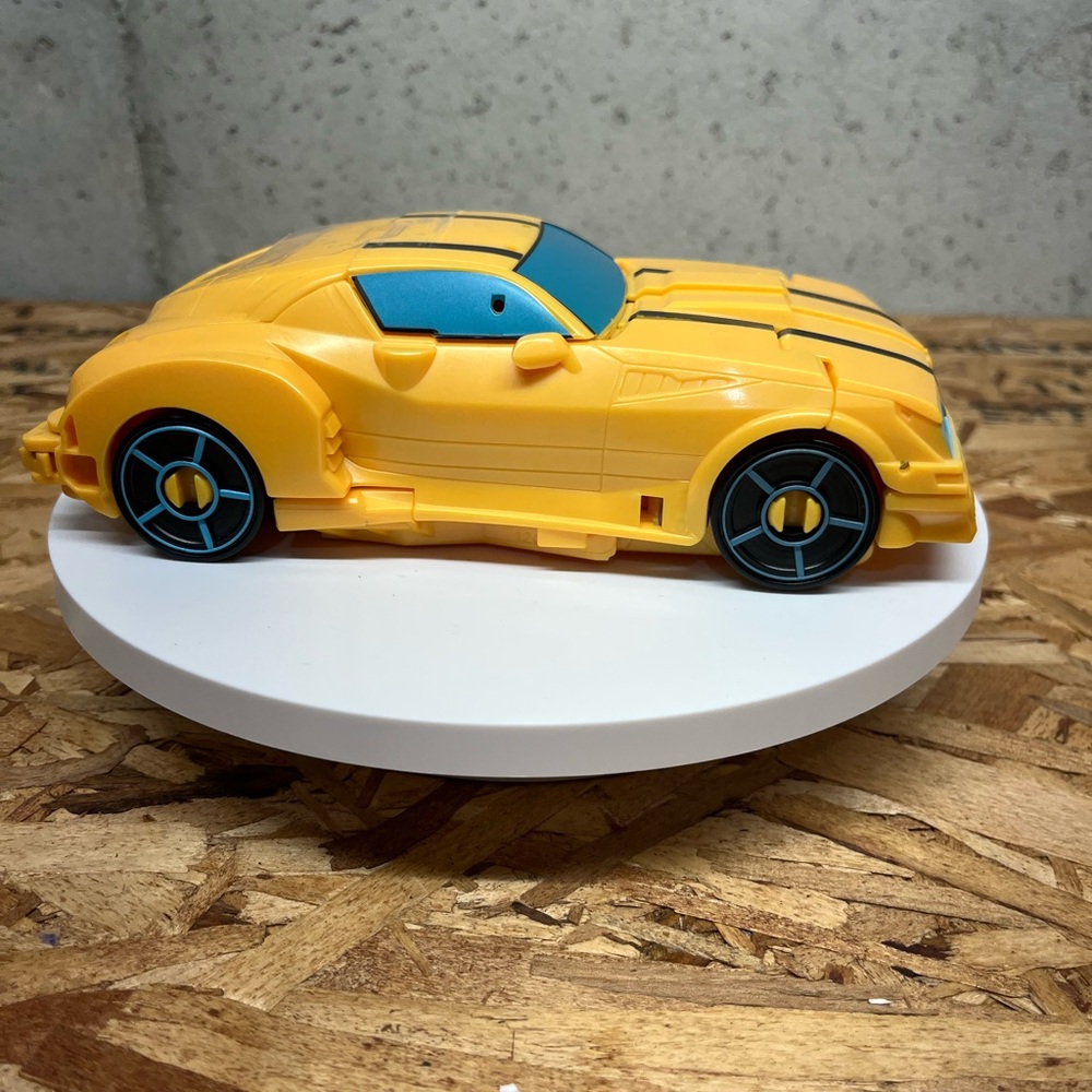 Speedy Yellow Toy Car with Blue Windows